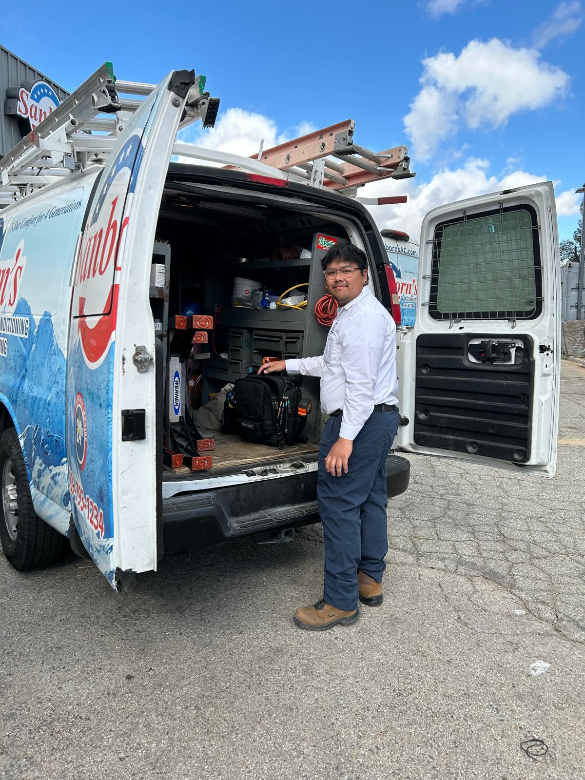 Sanborn's team and service vans